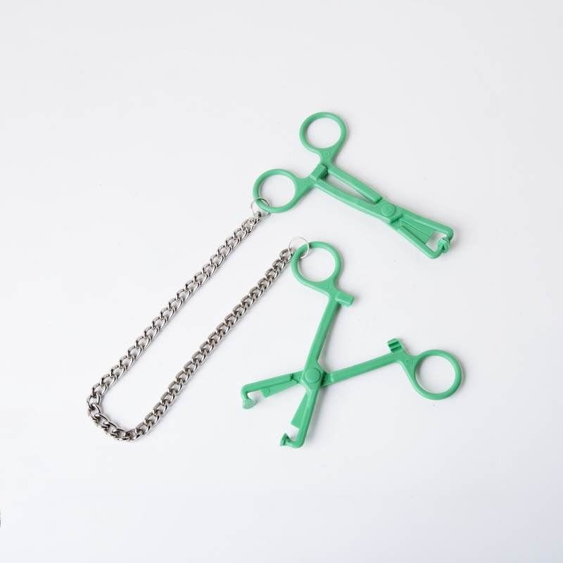 Green Tube Clamps on Chain from REGULATION.
