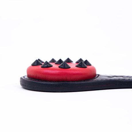 The Claw - Studded Ballbuster Paddle, Black & Red from Fetters.