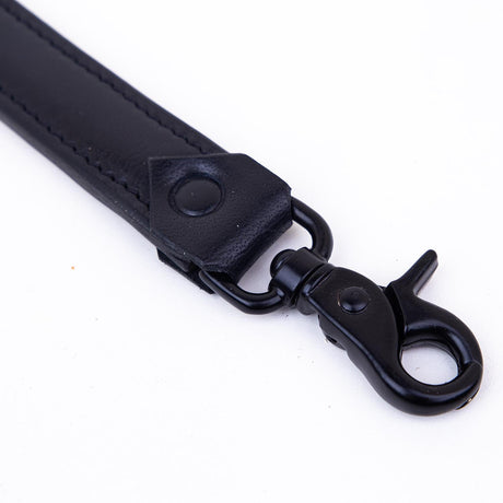 The Claw - Studded Ballbuster Paddle, Black & Red from Fetters.