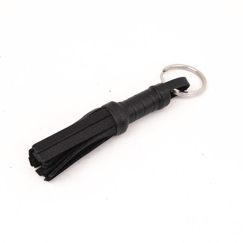 Mini porte-clés en cuir avec fouet