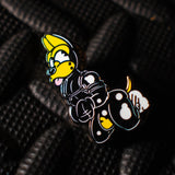 Rubber Dog Enamel Pin, Yellow from James Newland Illustration.